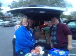 San Bernardino Masonic Lodge Thanksgiving food drive delivering Thanksgiving dinners two over thirty families 2014